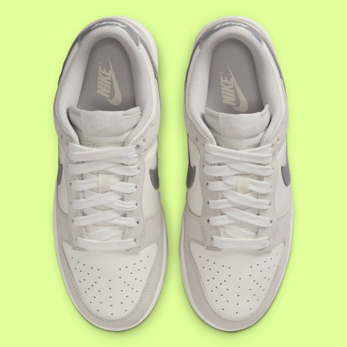 A Silver Swoosh Adds Spark To A Greyed Out Nike Dunk(图2)